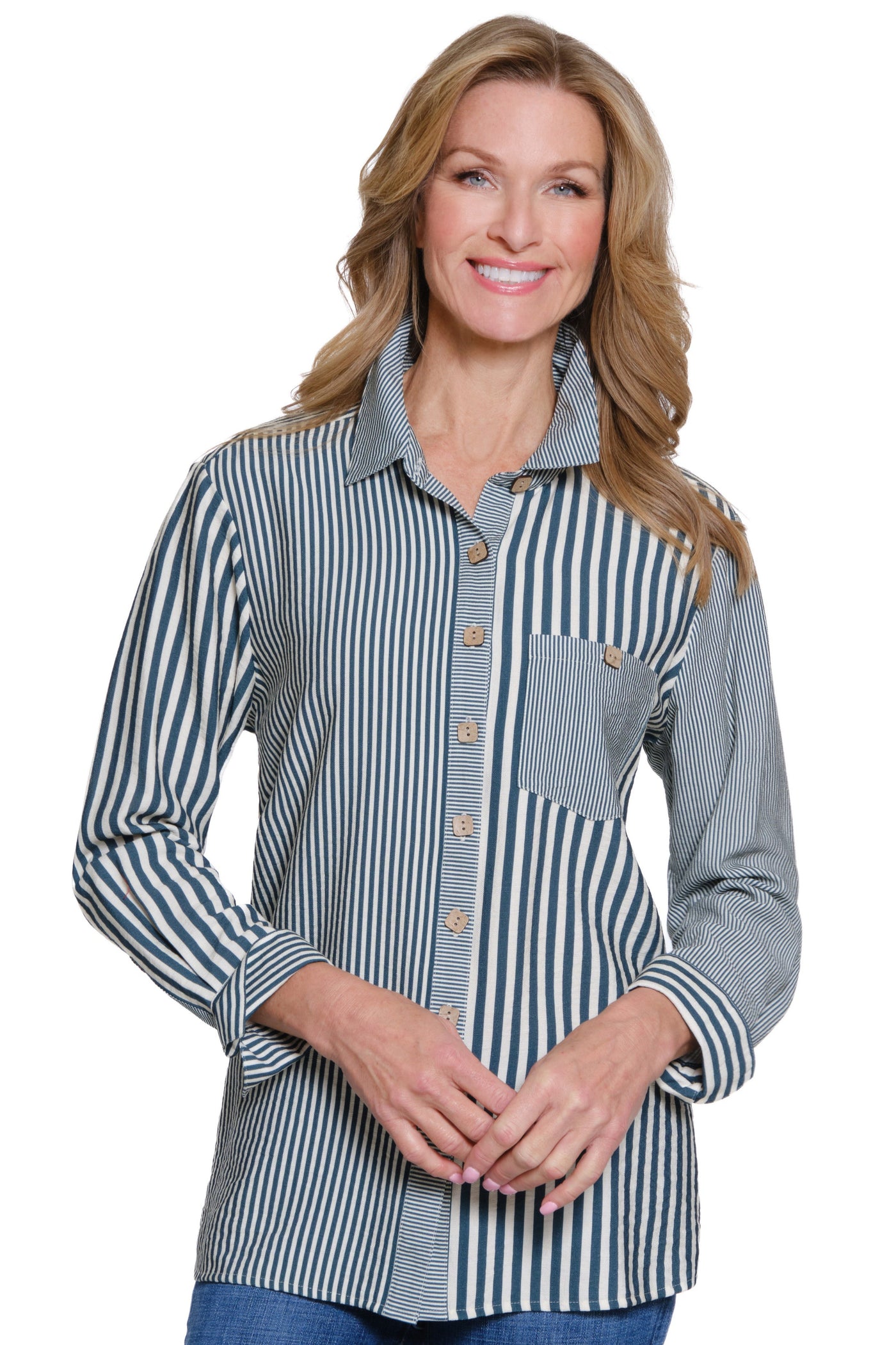 Woman wearing a striped shirt with a white background