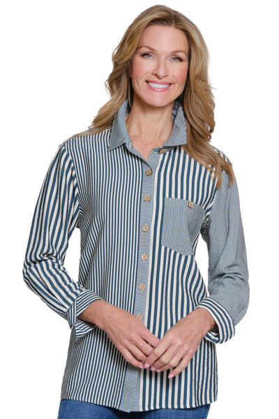 Woman wearing a striped shirt with a white background