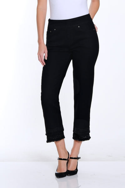 Woman wearing a white t-shirt and black pants on a white background