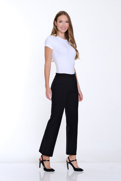Woman wearing a white t-shirt and black pants on a white background
