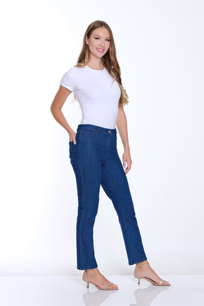 Woman wearing a white t-shirt and blue jeans on a white background
