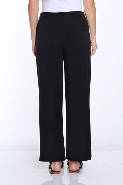 Person wearing a white t-shirt and black pants on a white background