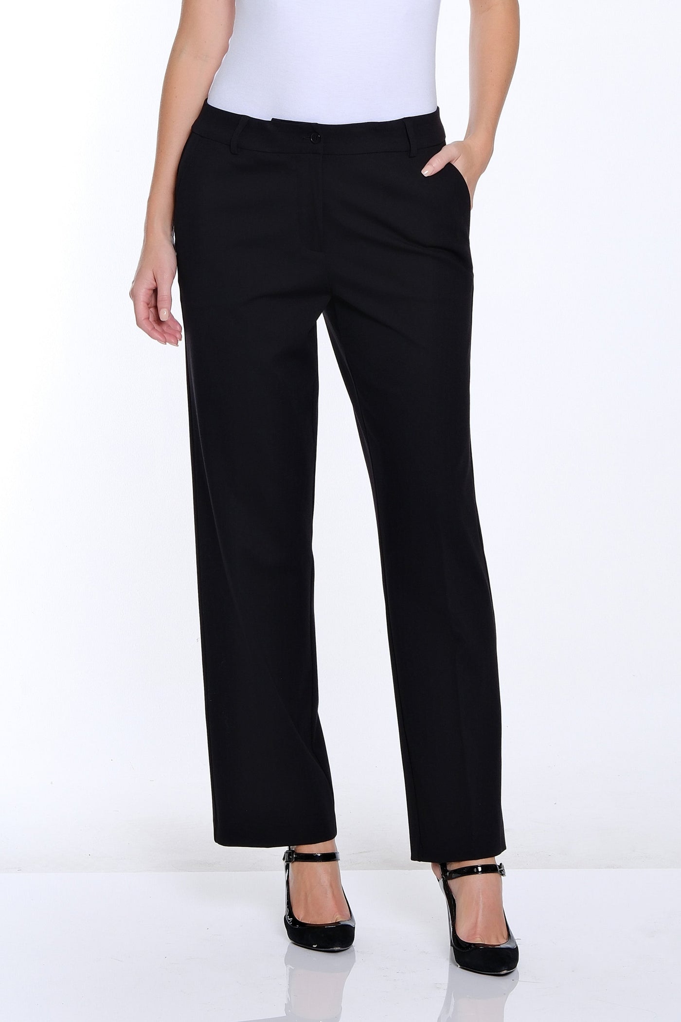 Woman wearing a white t-shirt and black pants on a white background